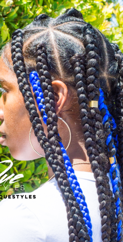 A woman with blue beads in her hair.